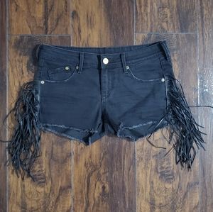 Black fringed shorts